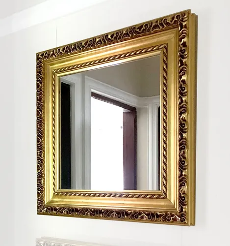 espelho decorativo dourado